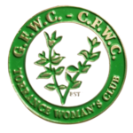 A green and white pin with the words " g. H. W. C." in it